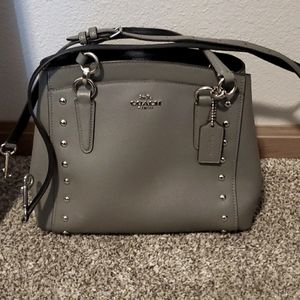 Grey coach purse with studs